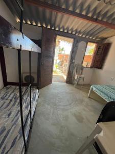 Ένα ή περισσότερα κρεβάτια σε δωμάτιο στο Mano Hostel