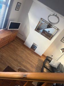 an overhead view of a living room with a couch at Morecambe Bay Cottage in Morecambe