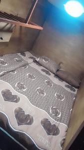 Postel nebo postele na pokoji v ubytování Petra dorms inn