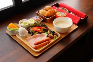 a tray of food on a table with a plate of food at Kyoto Takasegawa Bettei - Vacation STAY 69818v in Kyoto