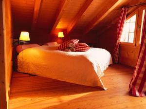 Postel nebo postele na pokoji v ubytování Chratidudel - Ski-in , Ski-out