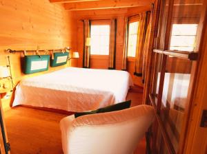 Postel nebo postele na pokoji v ubytování Chratidudel - Ski-in , Ski-out