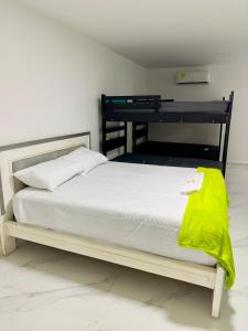Ένα ή περισσότερα κρεβάτια σε δωμάτιο στο cabaña villa rags