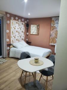 Postel nebo postele na pokoji v ubytování Studio cosy