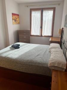 Postel nebo postele na pokoji v ubytování Callau Jaca