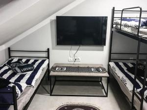 Ένα ή περισσότερα κρεβάτια σε δωμάτιο στο Hostel Płock