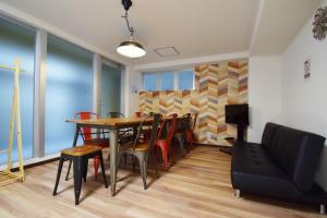a dining room with a table and chairs at Hostel In Kyoto Gion - Vacation STAY 13400v in Gionmachi
