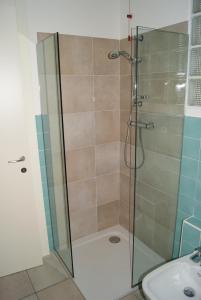 a bathroom with a shower and a sink at Guest House Residence Malpensa in Case Nuove +8 photos