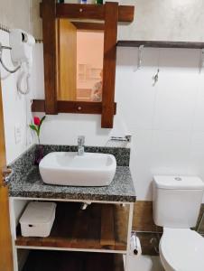 Koupelna v ubytování Quintal do Garnizé - Unidade Sabiá