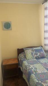 En eller flere senge i et værelse på apartamento playa 4 esquinas