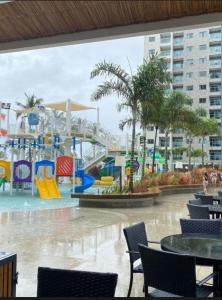 a water park with a slide and a playground at Salinas Exclusive Resort in Salinópolis +12 photos
