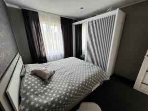 Postel nebo postele na pokoji v ubytování Aronsona