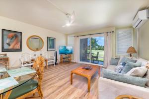 a living room with a couch and a table at Kuilima Golf Retreat in Kahuku
