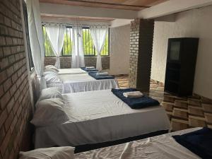 En eller flere senge i et værelse på Vacaciones Sol y Luna + 17 billeder