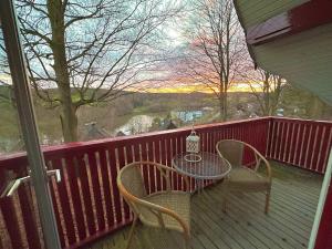 Balkón nebo terasa v ubytování Ferienhaus-Helly-Natur-pur-mit-Seeblick