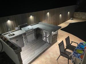 an overhead view of a kitchen with a table and chairs at Ville Verde in Loulé