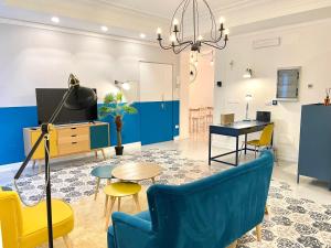 TV a/nebo společenská místnost v ubytování Le porte di Lecce Suites