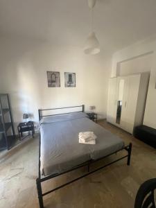 A bed or beds in a room at Il Fante locazione turistica