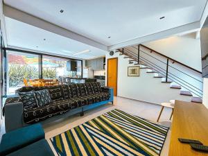 Χώρος καθιστικού στο Casa Rubi C/ jacuzzi E Quiosque privativo na praia