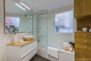 a bathroom with a sink and a glass shower at Center Pamplona Apartment UAT00537 in Pamplona +8 photos