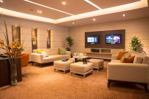 TV a/nebo společenská místnost v ubytování Hotel Dann Carlton Bogota