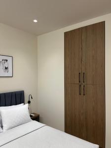 Ένα ή περισσότερα κρεβάτια σε δωμάτιο στο Serenity Luxury Apartment 1