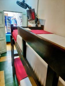 Un pat sau paturi într-o cameră la Hotel Boutique Stay La 10