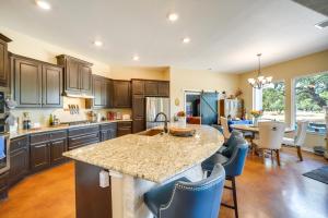 a kitchen with a large island with a counter top at Family-Friendly Johnson City Home Near State Parks in Hye