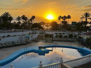 Bazén v ubytování Perla Paraiso Royal nebo v jeho okolí