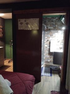 Posezení v ubytování Caverna di panda