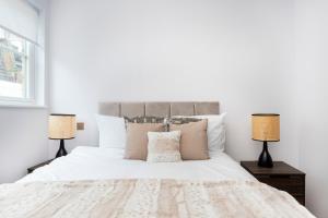 Ένα ή περισσότερα κρεβάτια σε δωμάτιο στο Gorgeous 3 Bed House in Paddington