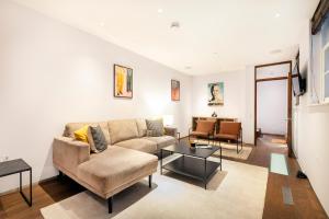 Χώρος καθιστικού στο Gorgeous 3 Bed House in Paddington