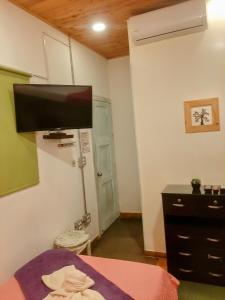 Un televizor și/sau centru de divertisment la Hotel Boutique Stay La 10