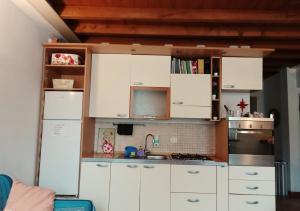 Kuchyň nebo kuchyňský kout v ubytování B&b del bosco e del lago Elimar