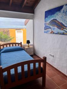 Posteľ alebo postele v izbe v ubytovaní Charming Villa with Sea View in El Roque, Private Pool