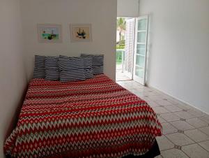 เตียงในห้องที่ Casa de Praia Luxo e Conforto +41 ภาพ