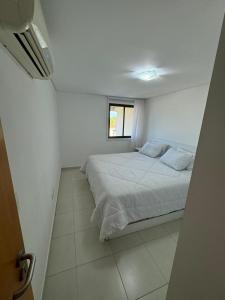 Postel nebo postele na pokoji v ubytování Flat Carneiros Beach Resort - Beira Mar Praia dos Carneiros + 73 fotografií