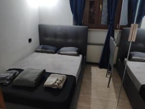 Postel nebo postele na pokoji v ubytování Mini Deluxe Room - Close to Metro C