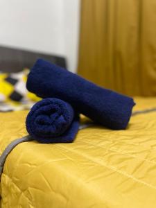 Ένα ή περισσότερα κρεβάτια σε δωμάτιο στο Hanz Homestay Melaka- Muslim Homestay 2