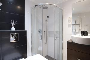 A bathroom at Budapest Downtown Museum Apartments