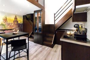 A kitchen or kitchenette at Budapest Downtown Museum Apartments