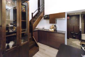 A kitchen or kitchenette at Budapest Downtown Museum Apartments Még 25 kép
