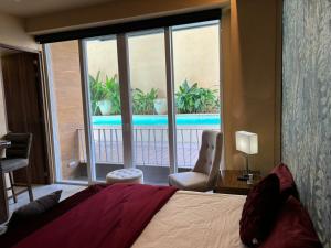 Ένα ή περισσότερα κρεβάτια σε δωμάτιο στο Beautiful studio +19 φωτογραφίες