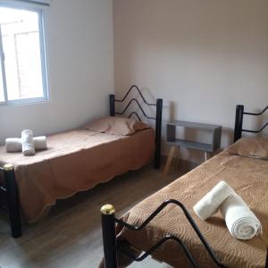 Postel nebo postele na pokoji v ubytování Quinta Francisco Mendoza + 7 fotografií