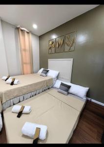 Ένα ή περισσότερα κρεβάτια σε δωμάτιο στο A & G Lodge