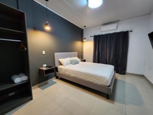 Postel nebo postele na pokoji v ubytování Estudio Premium en Comayagua