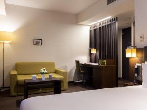 Postel nebo postele na pokoji v ubytování Hotel Gracery Tokyo Tamachi