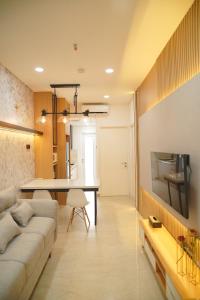 Χώρος καθιστικού στο Delipark Podomoro Lincoln Tower Apartement 2BR +7 φωτογραφίες