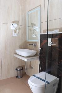 Koupelna v ubytování Sree Grand Inn