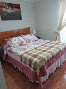 Ένα ή περισσότερα κρεβάτια σε δωμάτιο στο Puertas del mar